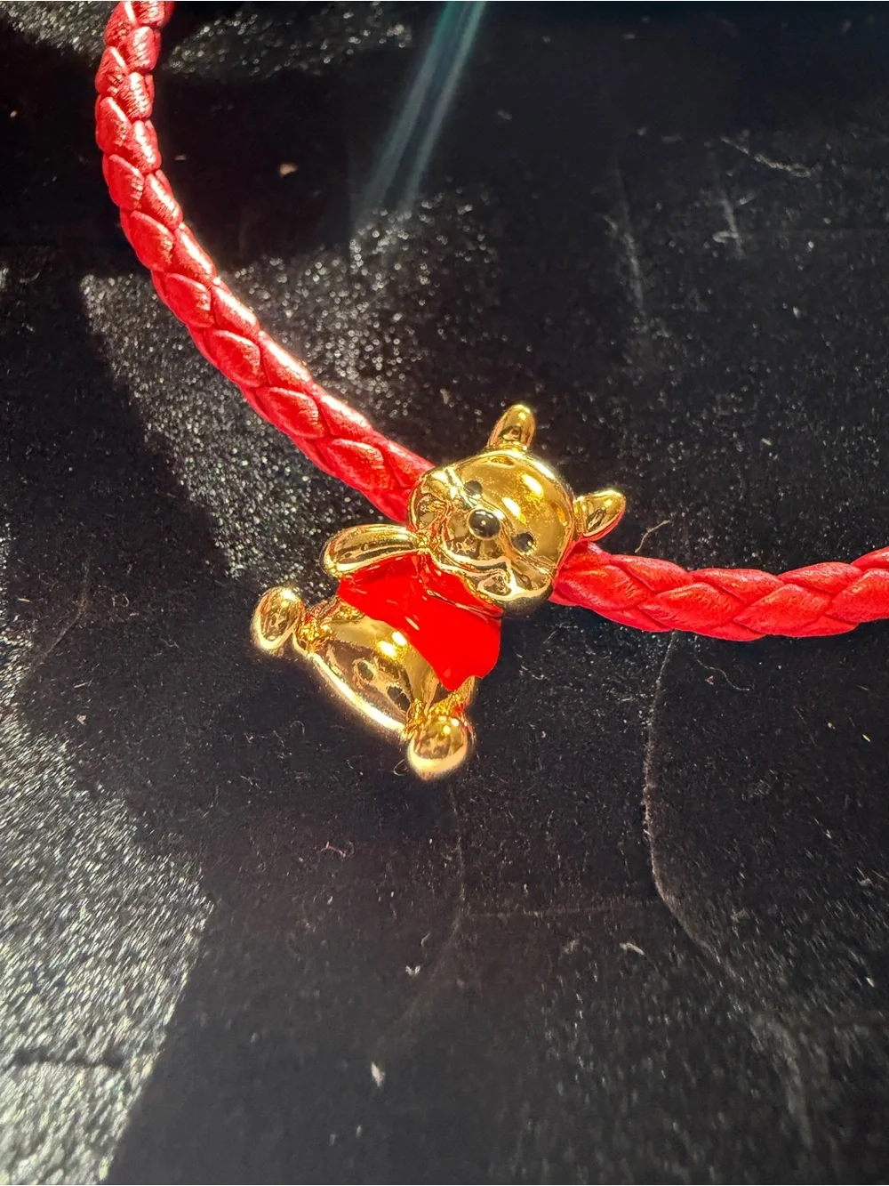 Pandora Winnie the Pooh charm and Red braided leather Pandora bracelet